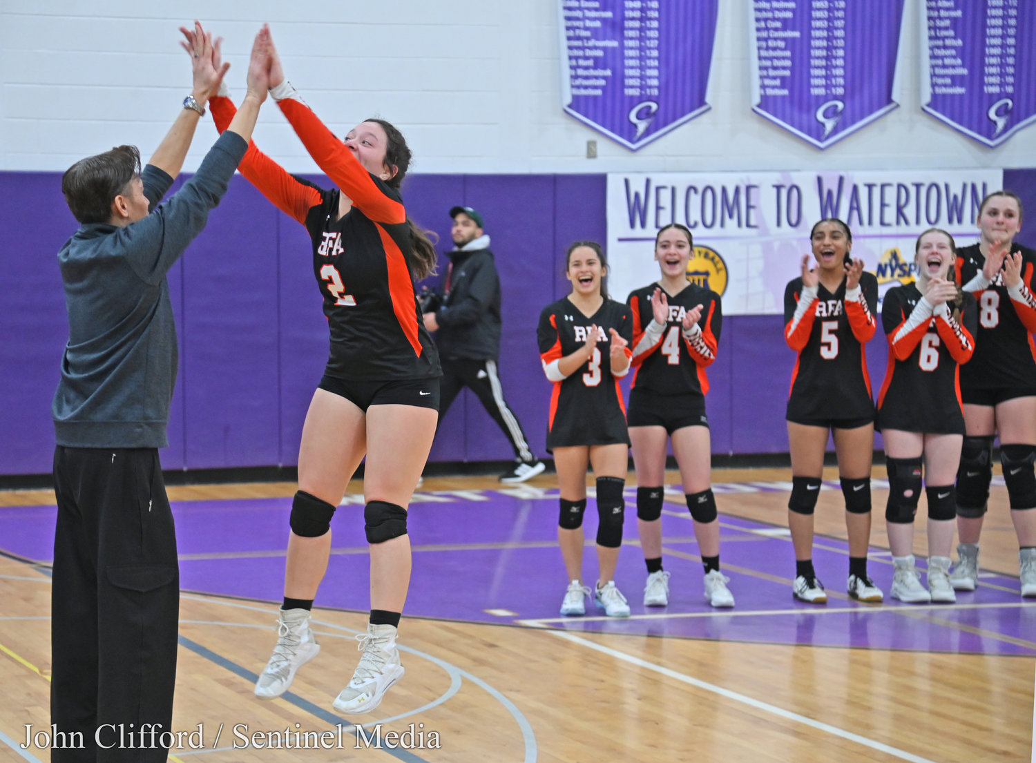 Rome Free Academy Black Knights girls volleyball team celebrate after they defeated Whitesboro in the Class A finals at Case Middle School in Watertown.
