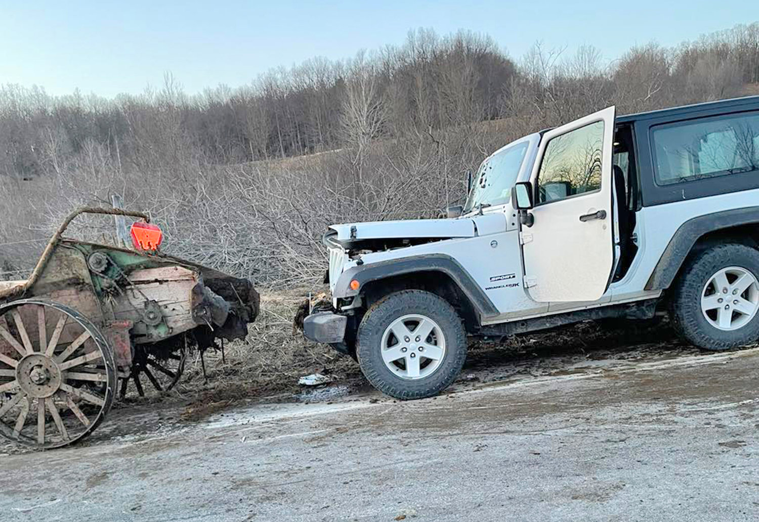 A Jeep crashed into the back of a horse-drawn manure spreader on Route 274 in Western Saturday afternoon, according to the Western Fire Department.