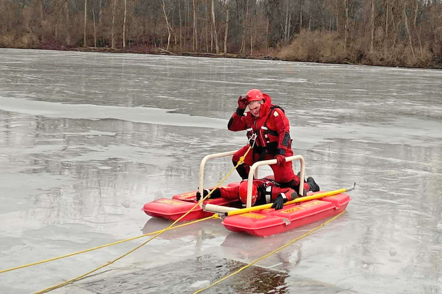 Rome firefighters ride their ice water rescue sled back to shore after a successful training exercise in the Barge Canal in Rome Tuesday afternoon.