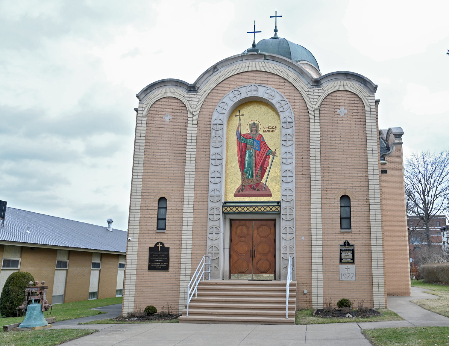NEW PLACE TO WORSHIP — Nearly 14,000 refugees fleeing the war in the Ukraine have come to seek a new life in New York, including some 200 or more in the Mohawk Valley.  Among those locally seeking to help is the community at St. Volodymyr Ukrainian Catholic Church in Utica. The bell on the lower left is from the Ukrainian Church recently torn down on River Street in Rome.