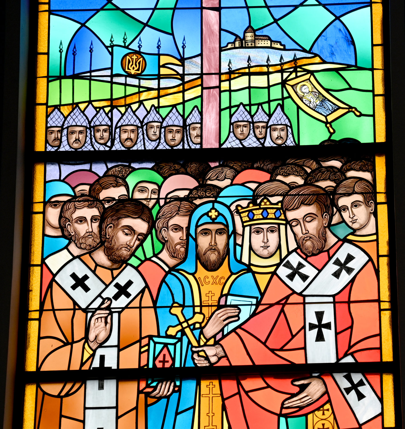 WINDOW TO THE WORLD — Stained glass imagery graces St. Volodymyr the Great Ukrainian Catholic Church in Utica on Tuesday. According to most recent figures from the United Nation’s human rights office, between 8,000 and 10,000 Ukrainian soldiers have been killed with more than 13,000 soldiers injured; another 7,199 Ukrainian civilians have been killed and 11,756 injured.