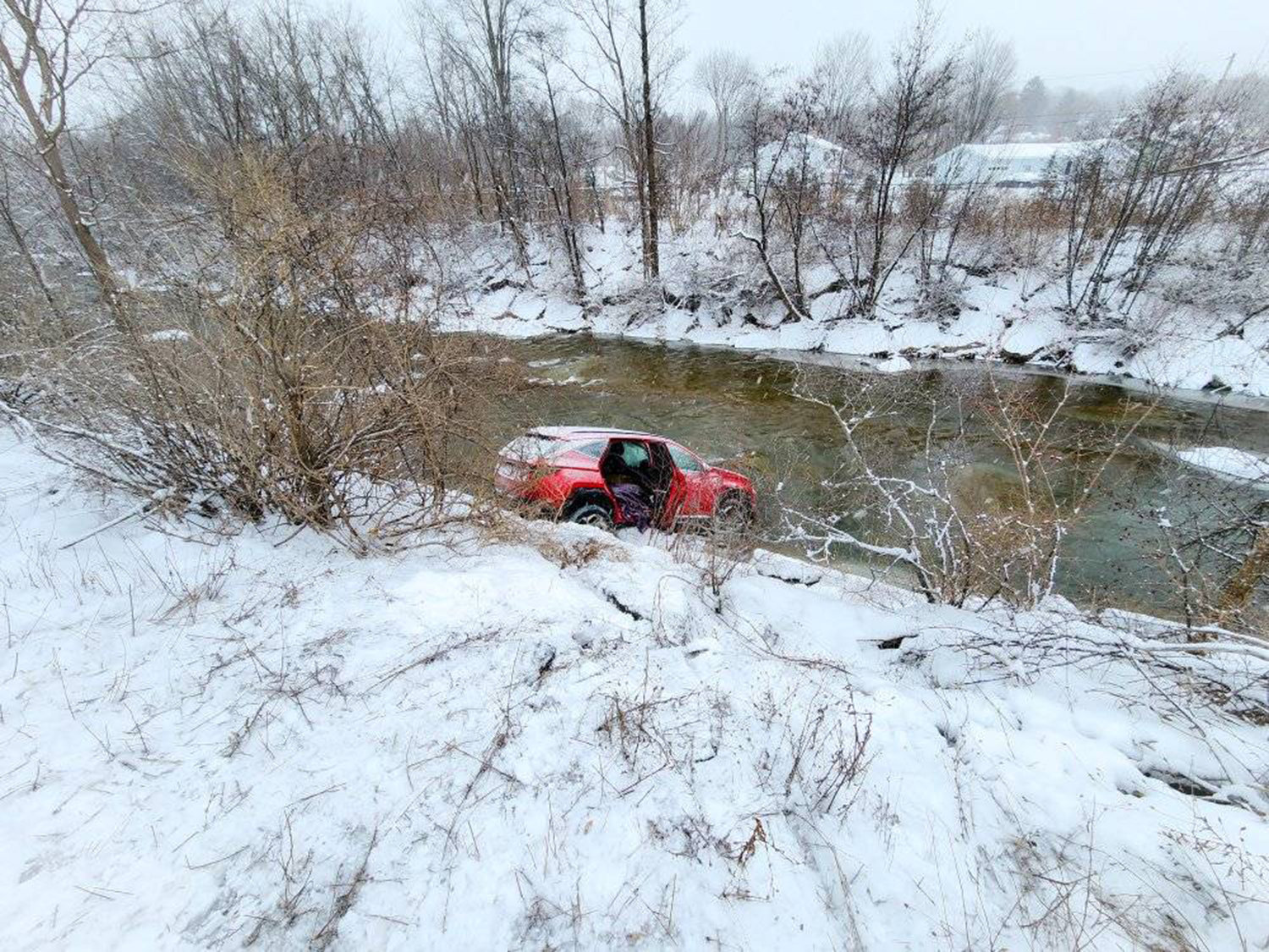 The driver of this SUV was pulled to safety after the vehicle crashed into the Sauquoit Creek off Route 8 Saturday afternoon, according to the Willowvale Fire Department.