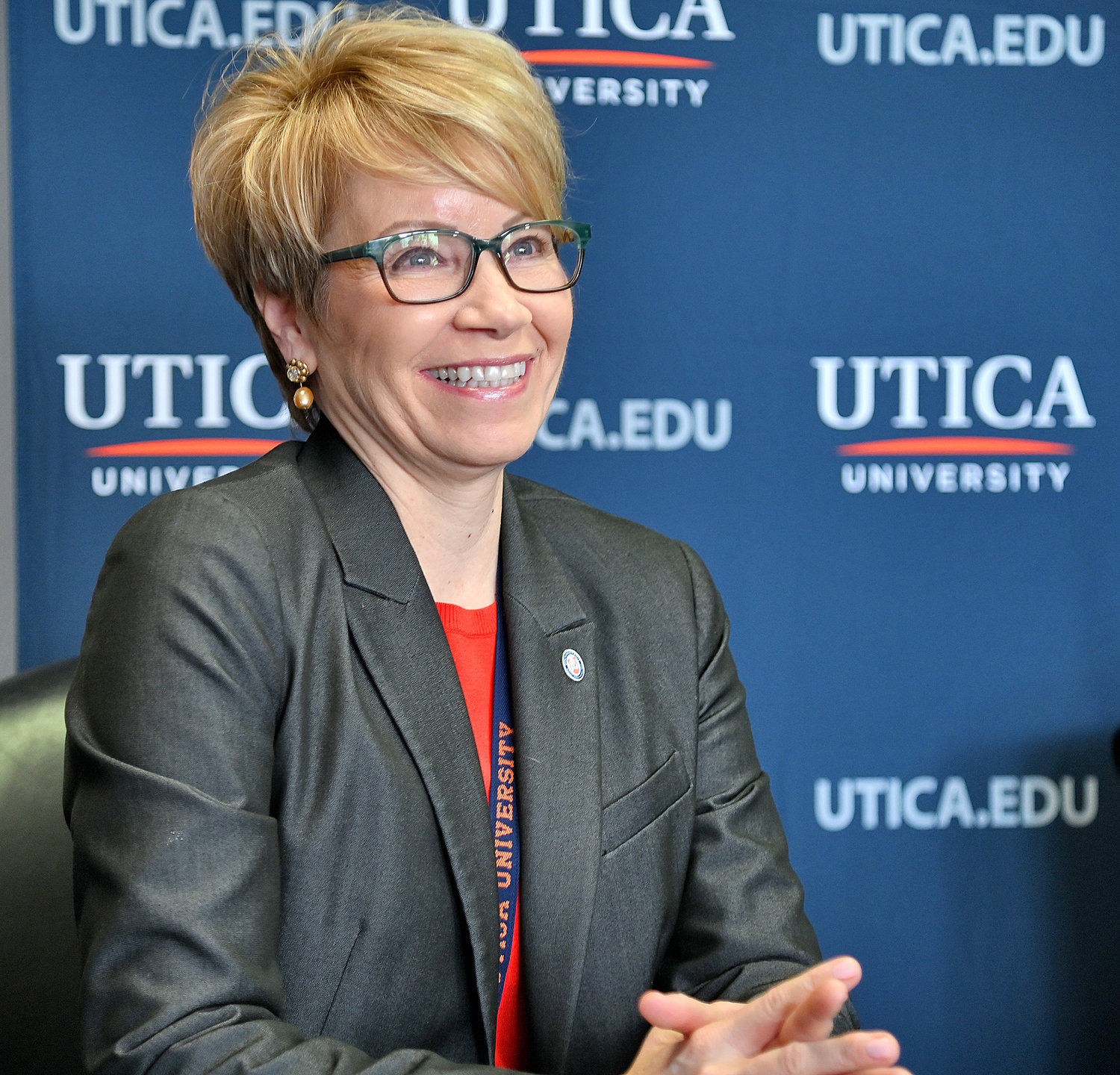 Retiring Utica University President Laura Casamento smiles Monday, Feb 27 during the announcement that Todd Pfannestiel will succeed her as the 10th university president.
