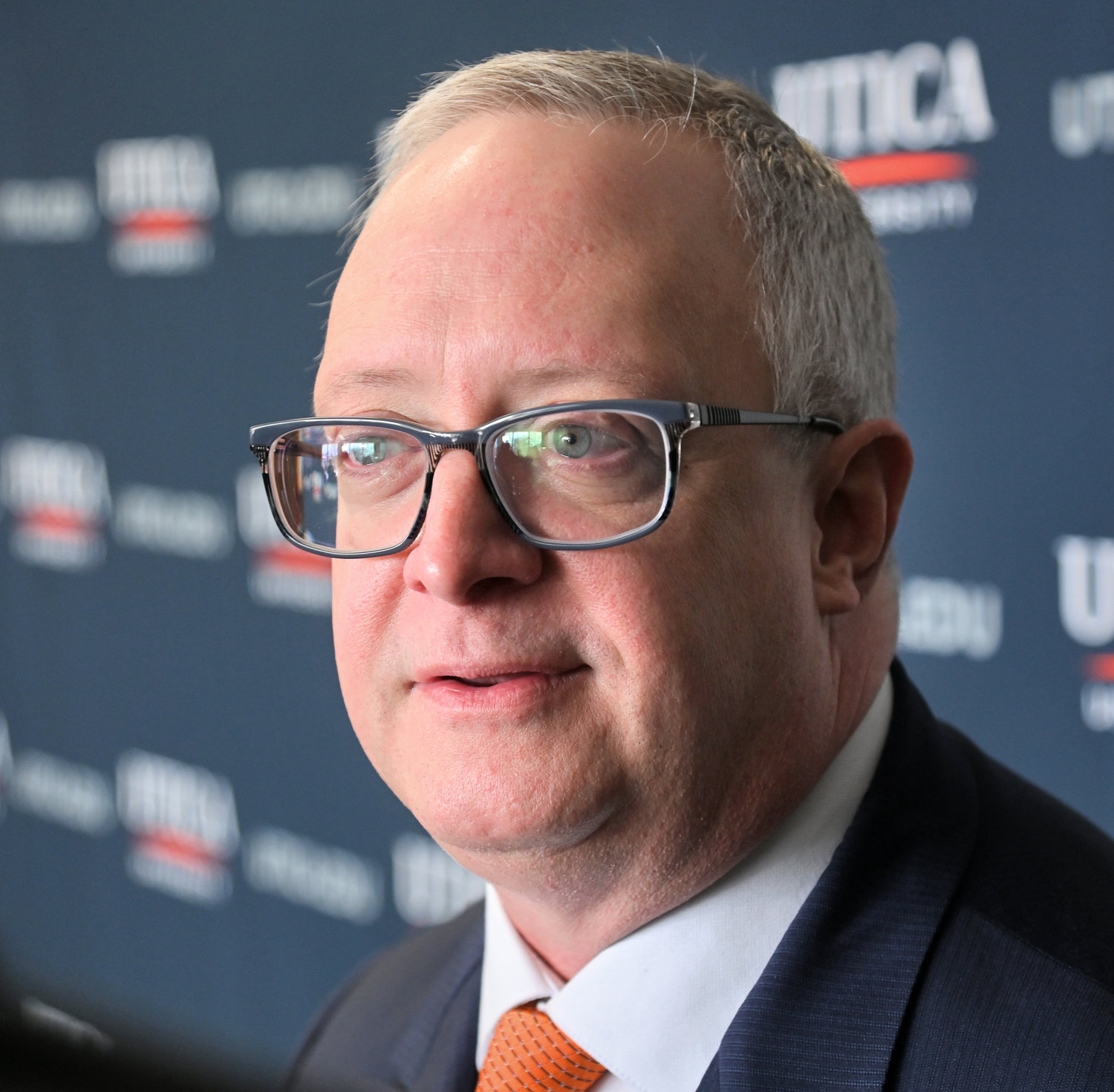 Todd Pfannestiel listens to questions Monday, Feb. 27 during the announcement of his selection as the 10th president of Utica University.