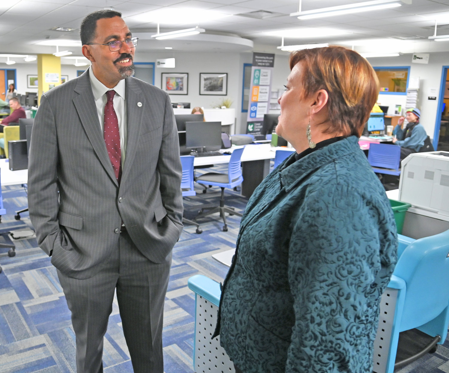 SUNY Chancellor John B. King, left, tours the MVCC tutoring center Wednesday, March 1 in Utica and talks with Tamara Mariotti, coordinator of the Office of Accessibility Resources at MVCC.