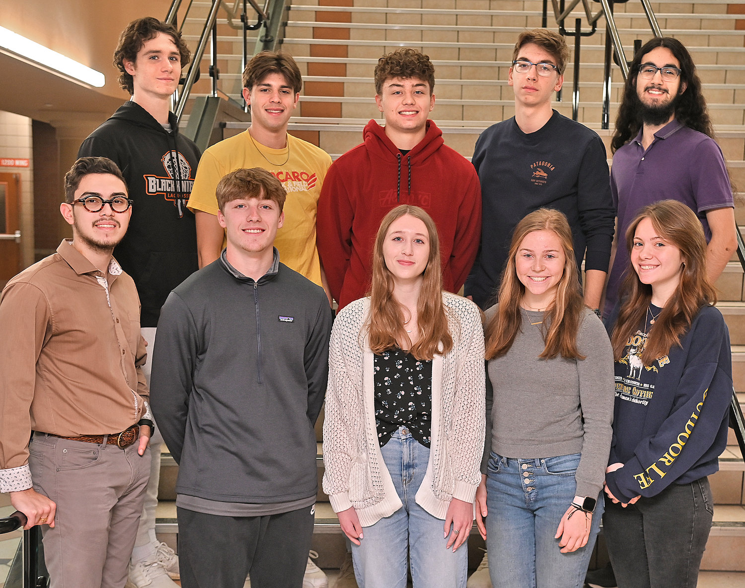 Members of the Top 10 in Rome Free Academy’s Class of 2023 pause for a group photo before heading off to class on Wednesday, March 2. From left, front row:  Kenneth Davis, Jacob Premo, Katelyn Boyer, Kaitlyn Jones and Haylie Pedersen; back row: Brent Viviani, Collin Gannon, Collin Mummert, Dennis Van Hoesel and Enrique Rivera.