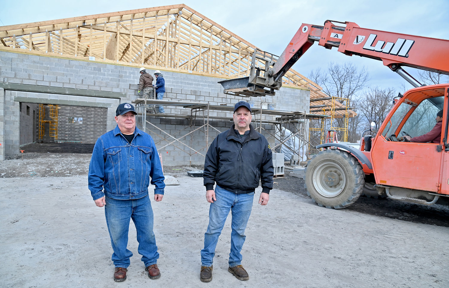 Joe and Brian Mazzaferro in front of what will be the entrance of their new store on Route 46 in Rome, across from Ridge Mills Elementary,