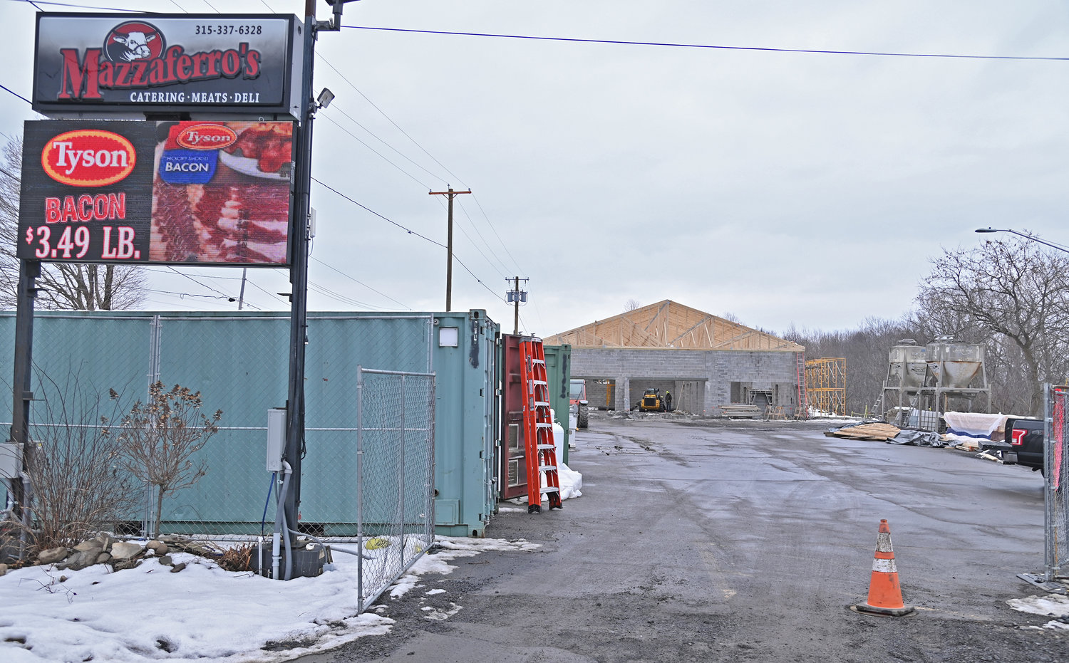 Mazzaferro's marquee with the new building going up in the background Monday, February 6, 2023.