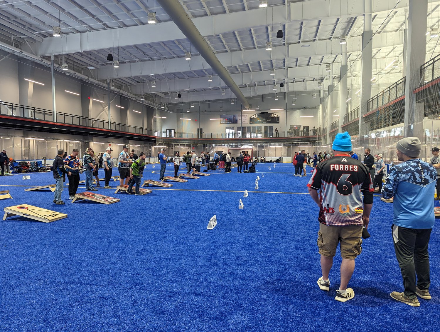 Custom-printed jerseys and shirts were all the rage at the professional cornhole tournament at the Utica University Nexus Center on Saturday. Amateurs and professionals are known to travel even states away to participate in monthly regional tournaments.