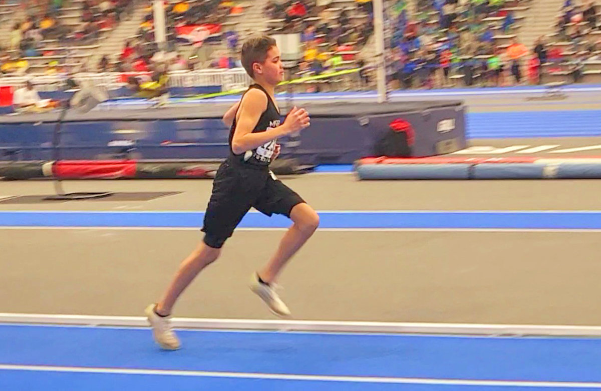 Jamary Bushey, a 14-year-old from Notre Dame, set personal records in the 800 and 1,500 at the 2023 AAU Indoor Track and Field Nationals in Virginia Beach. It was his first time competing at a national event.