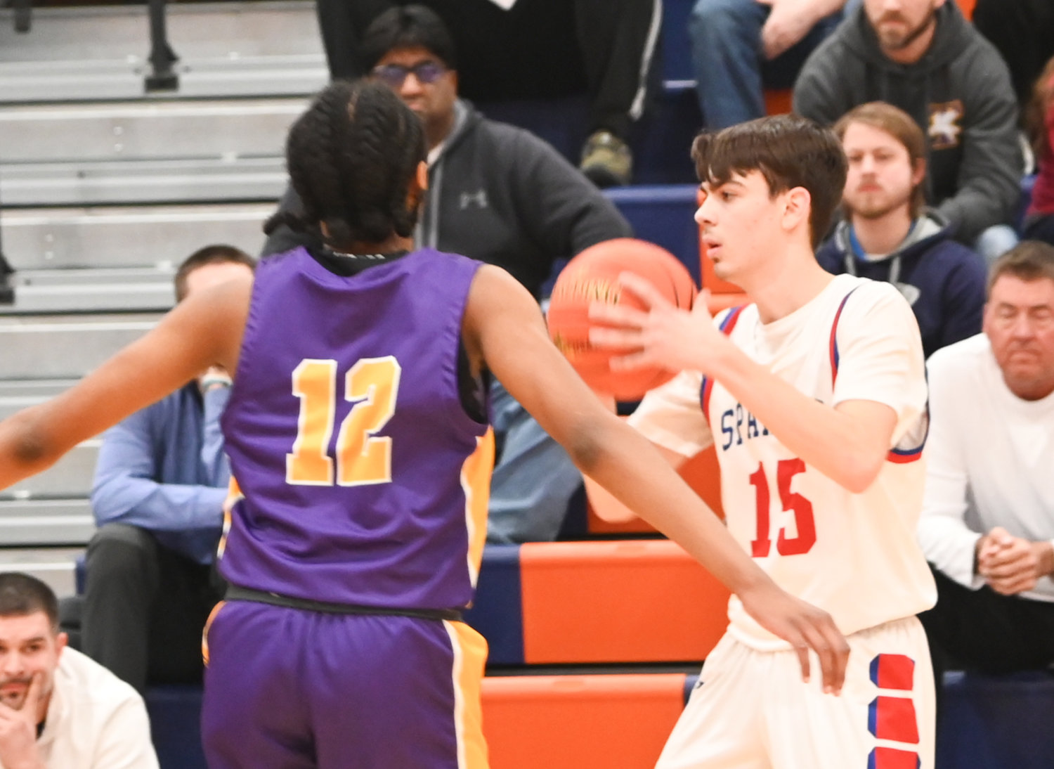 New Hartford's Jameson Stockwell (15) looks to make a play on Wednesday against Troy in a Class A subregional game at Liverpool High School. Stockwell finished with 28 points -- including 20 in the second half -- to help New Hartford to a 69-60 win.