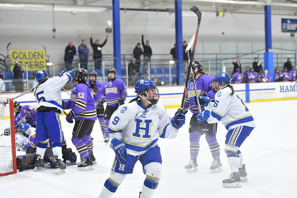 The Hamilton College women's hockey team celebrates the game's first goal Thursday night at home at Russell Sage Rink in Clinton. Hamilton beat Nazareth in the opening round of the NCAA Division III playoffs 3-1. Abby Smith (9) skates away from the Nazareth goal after taking the initial shot that led to a goal by Sami Quackenbush (5) just under seven minutes into the contest.