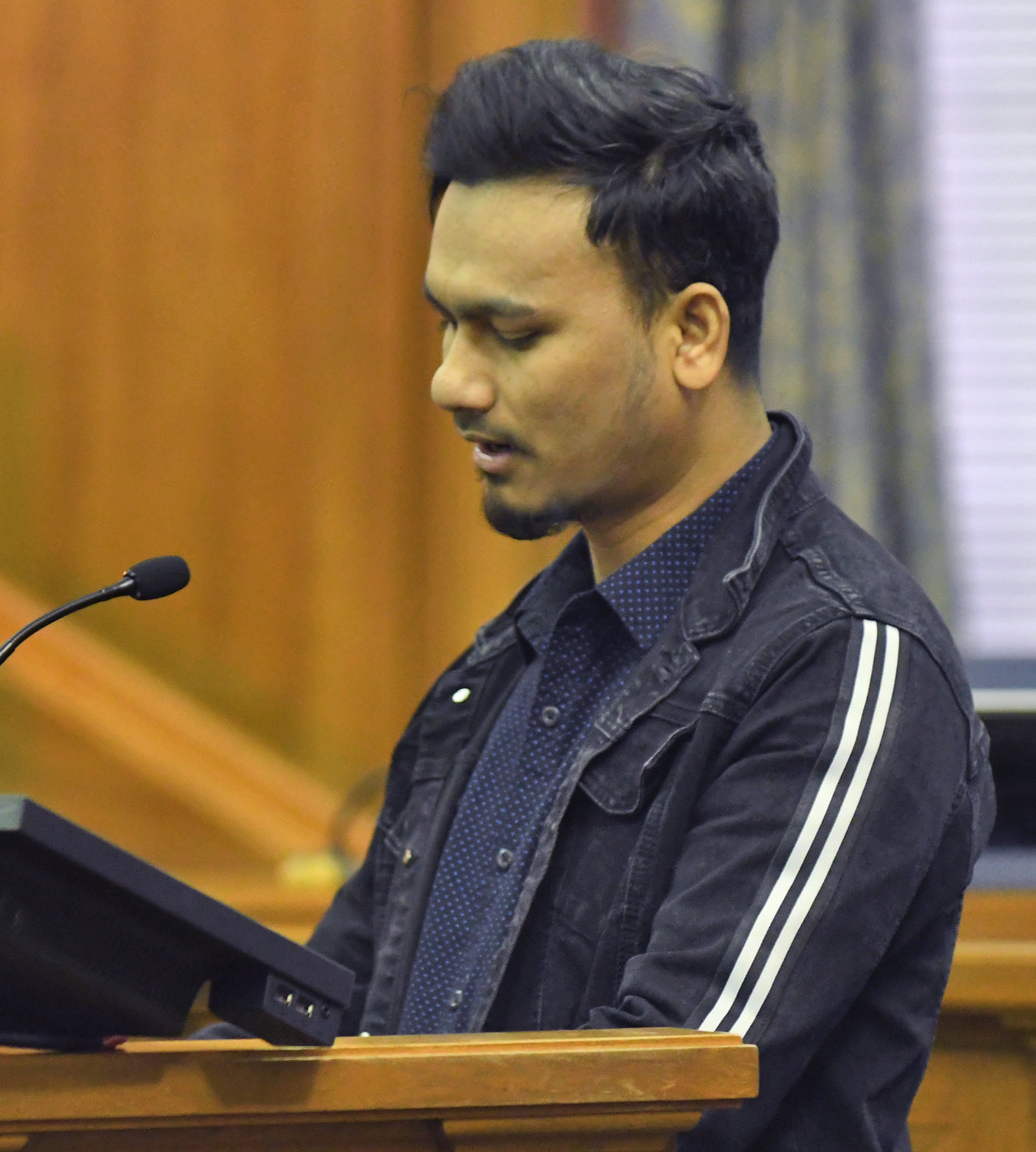 New citizen Ali Bin Mohamad Sekali formerly of Burma made comments to his peers from the new citizen perspective Thursday during the Naturalization Cerremony at the Alexander Pirnie Federal Courthouse in Utica.