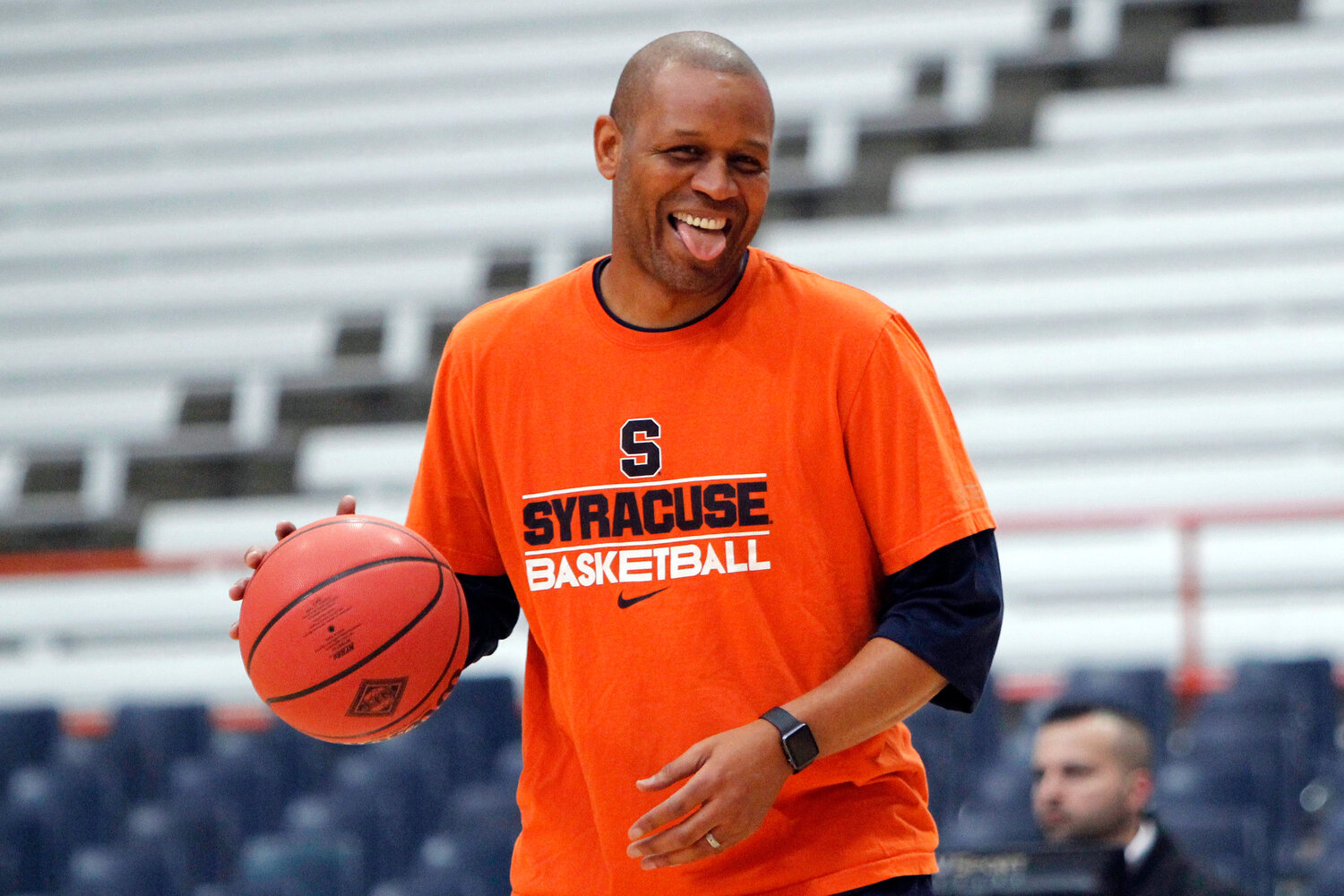 Syracuse assistant coach Adrian Autry jokes with players before an NIT game against Mississippi on March 18 in Syracuse. Syracuse formally introduced Autry as the new men's basketball coach Adrian, but it turned into more of a celebration of Jim Boeheim, the Hall of Fame coach Autry is succeeding.