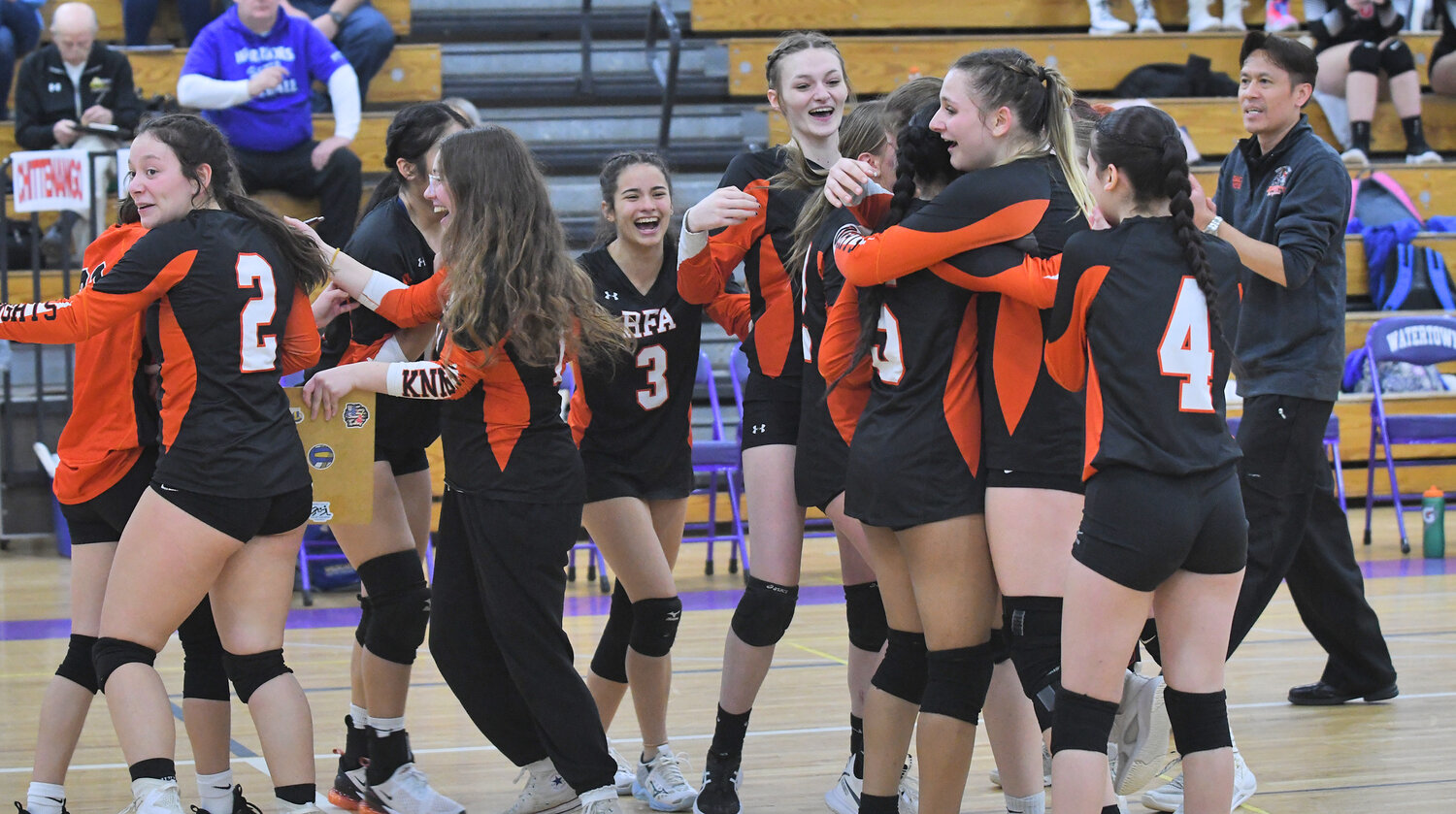 Rome Free Academy Black Knights girls volleyball team celebrate after they defeated Whitesboro in the Class A finals in February. Pete Keoviengsamay was named the Tri-Valley League coach of the year after helping guide the team.