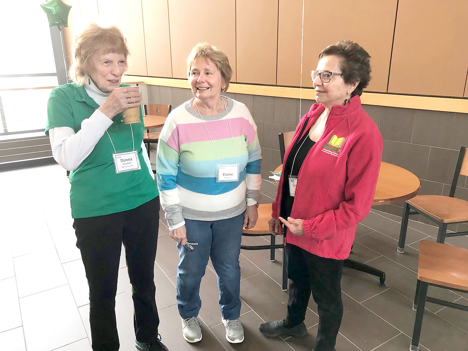 Program members, from left, Donna Goodwin, Elaine Atkinson and Cynthia DeTraglia chat Thursday, March 9 during the Mohawk Valley Institute for Learning in Retirement open house event at Mohawk Valley Community College in Rome.