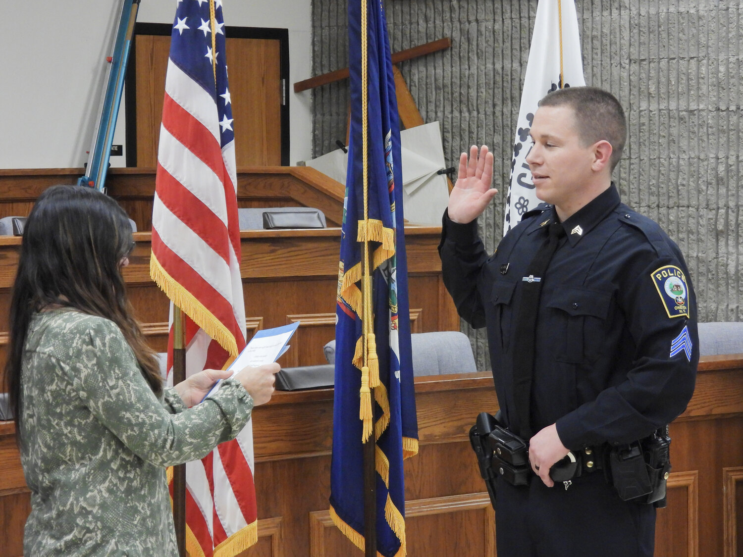Sergeant Matthew Mosack takes takes his oath at a swearing-in ceremony in the Oneida Common Council on Thursday, March 9. Mosack joined the OPD as an intern in 2011 during high school. He graduated Utica College with a bachelor's degree in cybersecurity and information assurance, with a concentration in cybercrime investigation and forensics