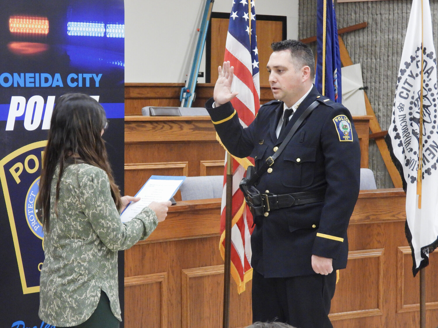 Lieutenant Keith Hudson takes takes his oath at a swearing-in ceremony in the Oneida Common Council on Thursday, March 9. Hudson transferred from the Cazenovia Police Department in 2008, returning to his hometown. He preforms many administrative roles with various IT systems at the Department