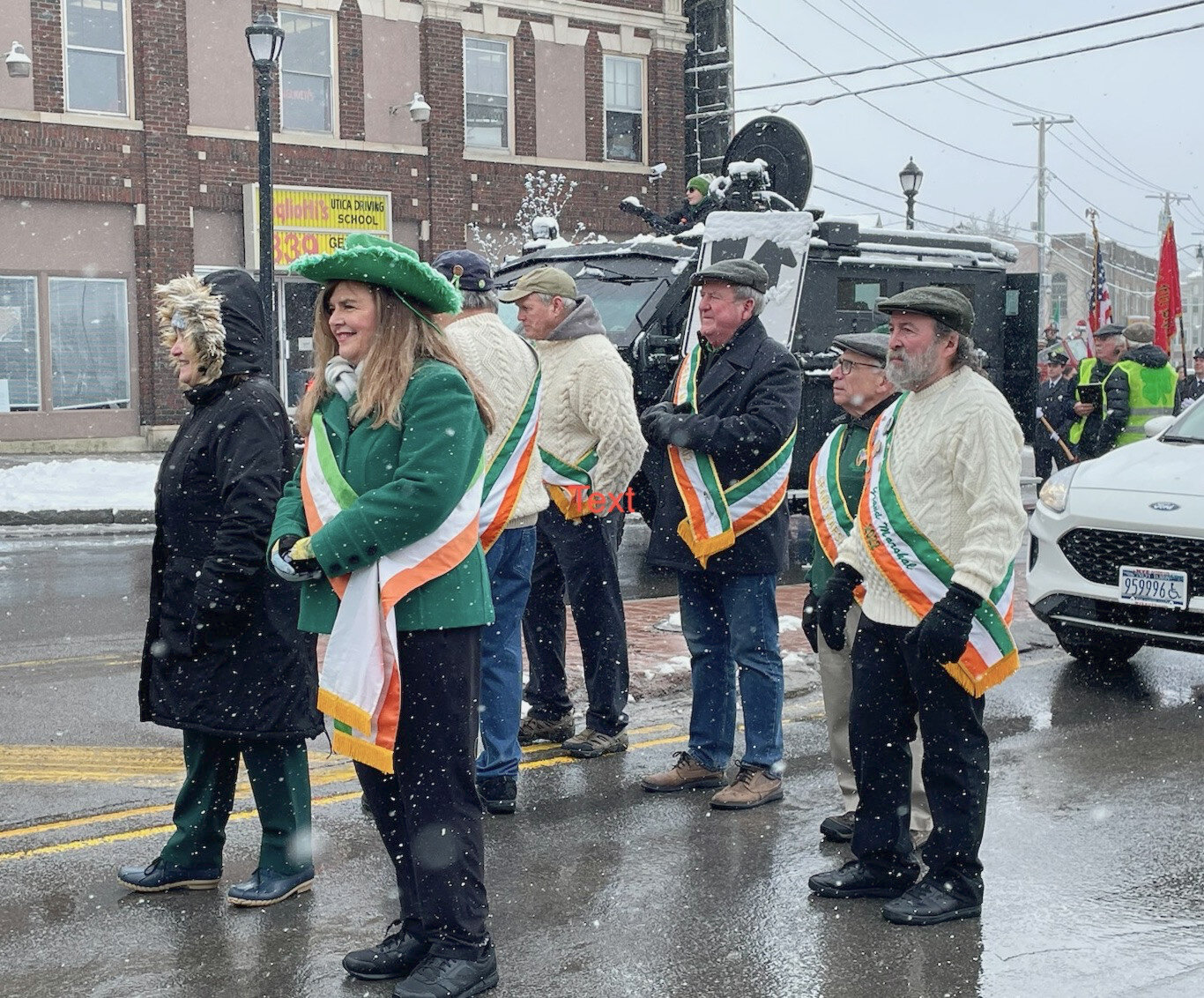 It's official as Utica Irish Cultural Center officials help kick off Utica's annual St. Patrick's Day Parade Saturday with past (2022) Grand Marshal Al Sisti at far right.
