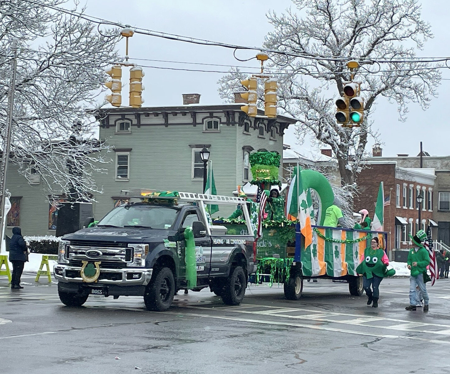Country Suburban is all deked out in Irish pride as they make their way through Utica's St. Patrick's Day Parade.