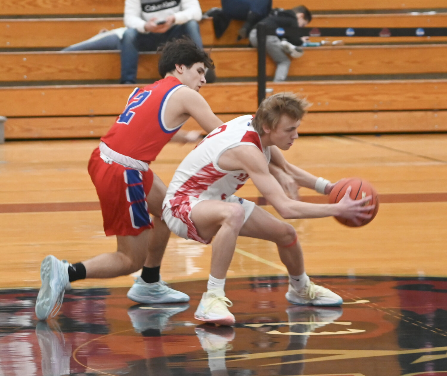 New Hartford's Sal Weller Jr. tries to steal the ball against a Massena player in the state Class A regional final on Saturday at SUNY Potsdam.