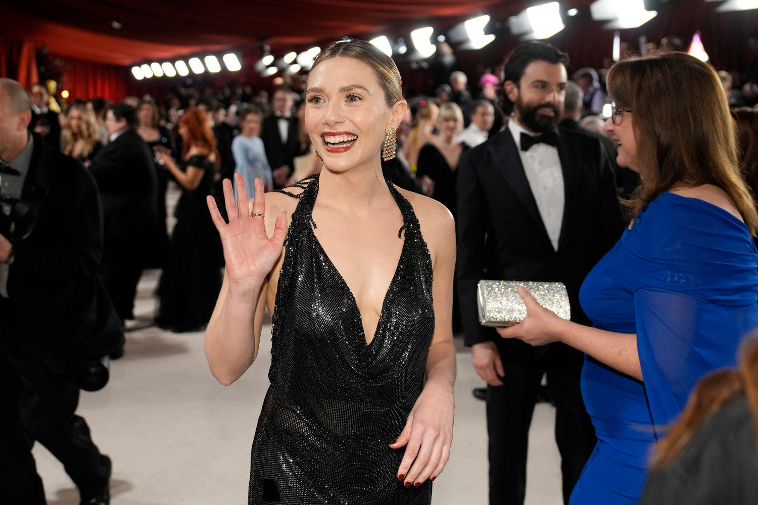 Elizabeth Olsen arrives at the Oscars on Sunday, March 12, 2023, at the Dolby Theatre in Los Angeles. (AP Photo/John Locher)