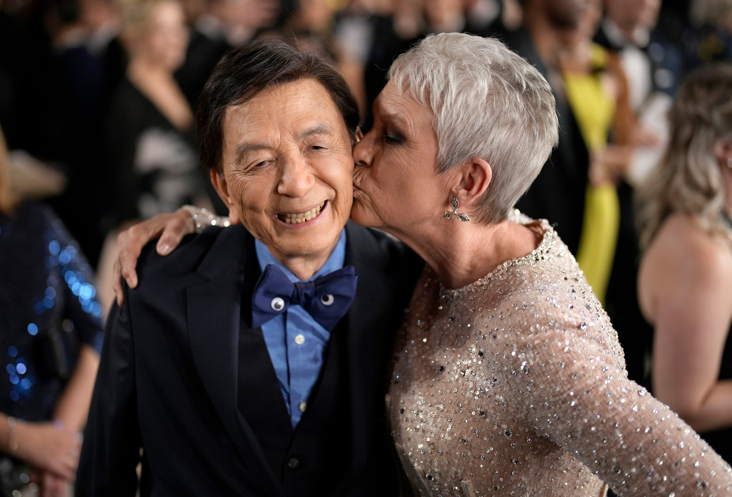 James Hong, left, and Jamie Lee Curtis arrive at the Oscars on Sunday, March 12, 2023, at the Dolby Theatre in Los Angeles. (AP Photo/John Locher)