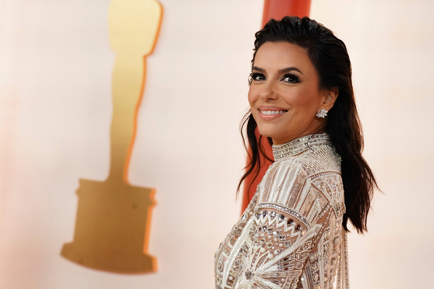 Eva Longoria arrives at the Oscars on Sunday, March 12, 2023, at the Dolby Theatre in Los Angeles. (Photo by Jordan Strauss/Invision/AP)