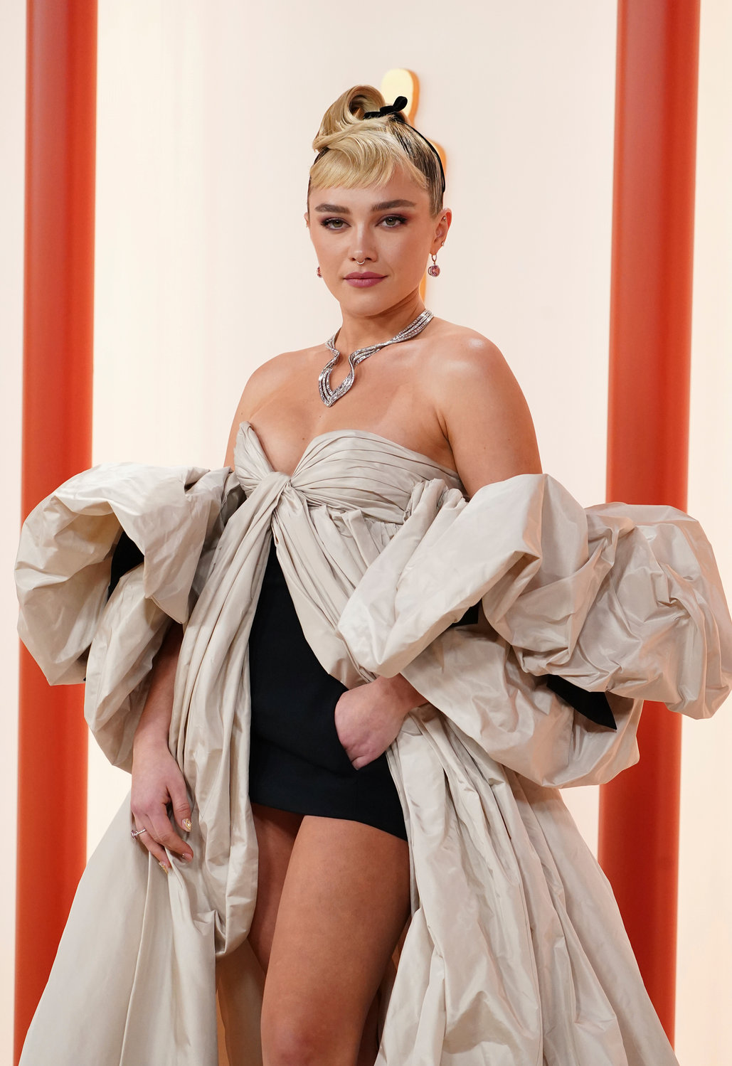 Florence Pugh arrives at the Oscars on Sunday, March 12, 2023, at the Dolby Theatre in Los Angeles. (Photo by Jordan Strauss/Invision/AP)