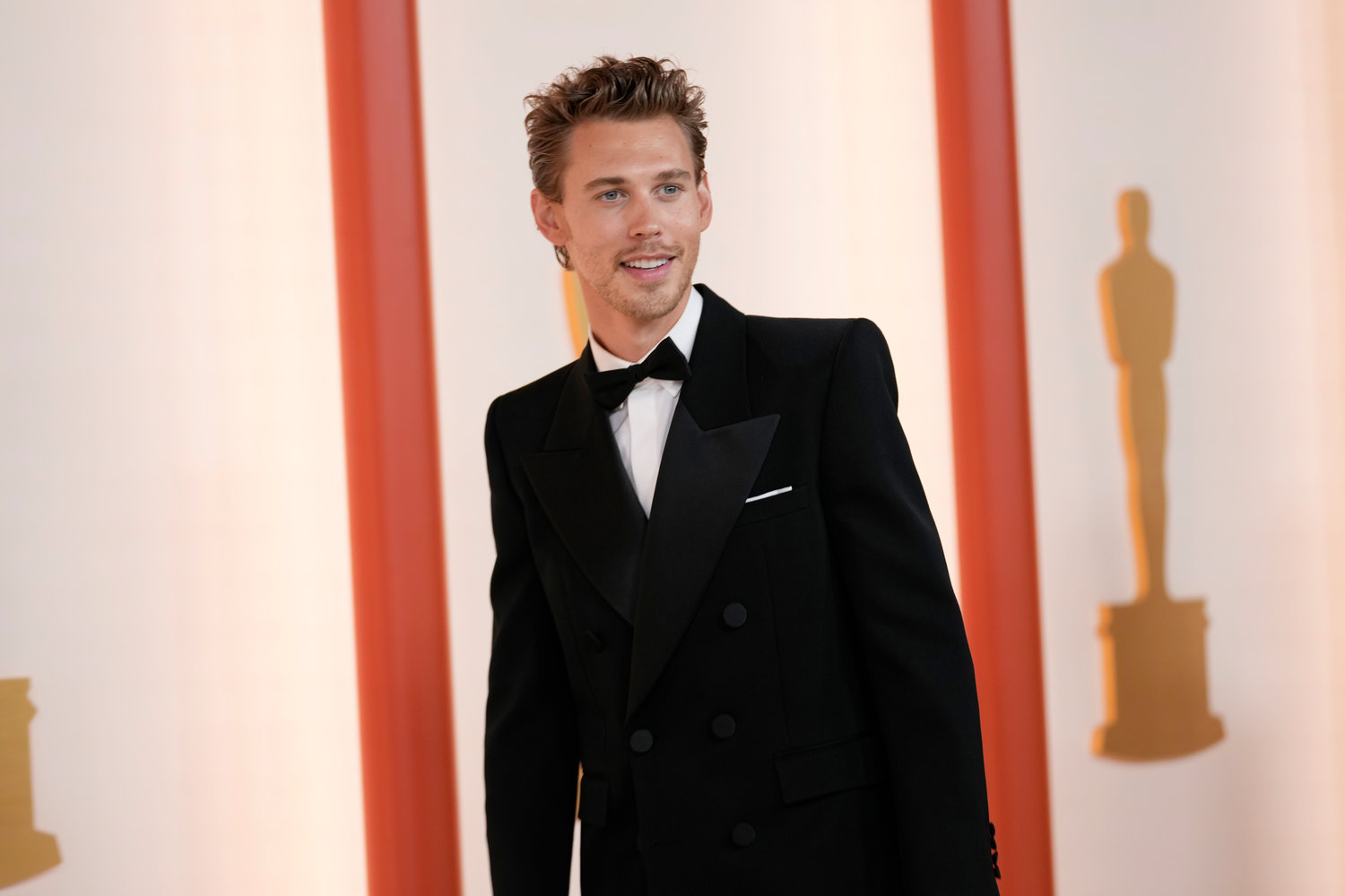 Austin Butler arrives at the Oscars on Sunday, March 12, 2023, at the Dolby Theatre in Los Angeles. (AP Photo/Ashley Landis)