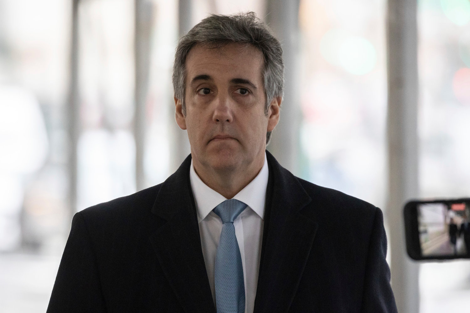 Michael Cohen arrives at the district attorney's office to testify before a grand jury in New York, Monday, March 13, 2023.