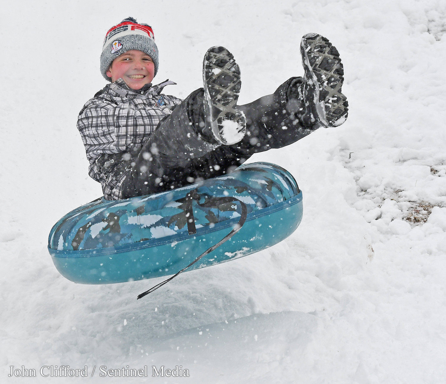 Jackson Brawdy, 11,  takes a jump off the hill at Ridgewood Heights Park Tuesday, March 14, 2023.