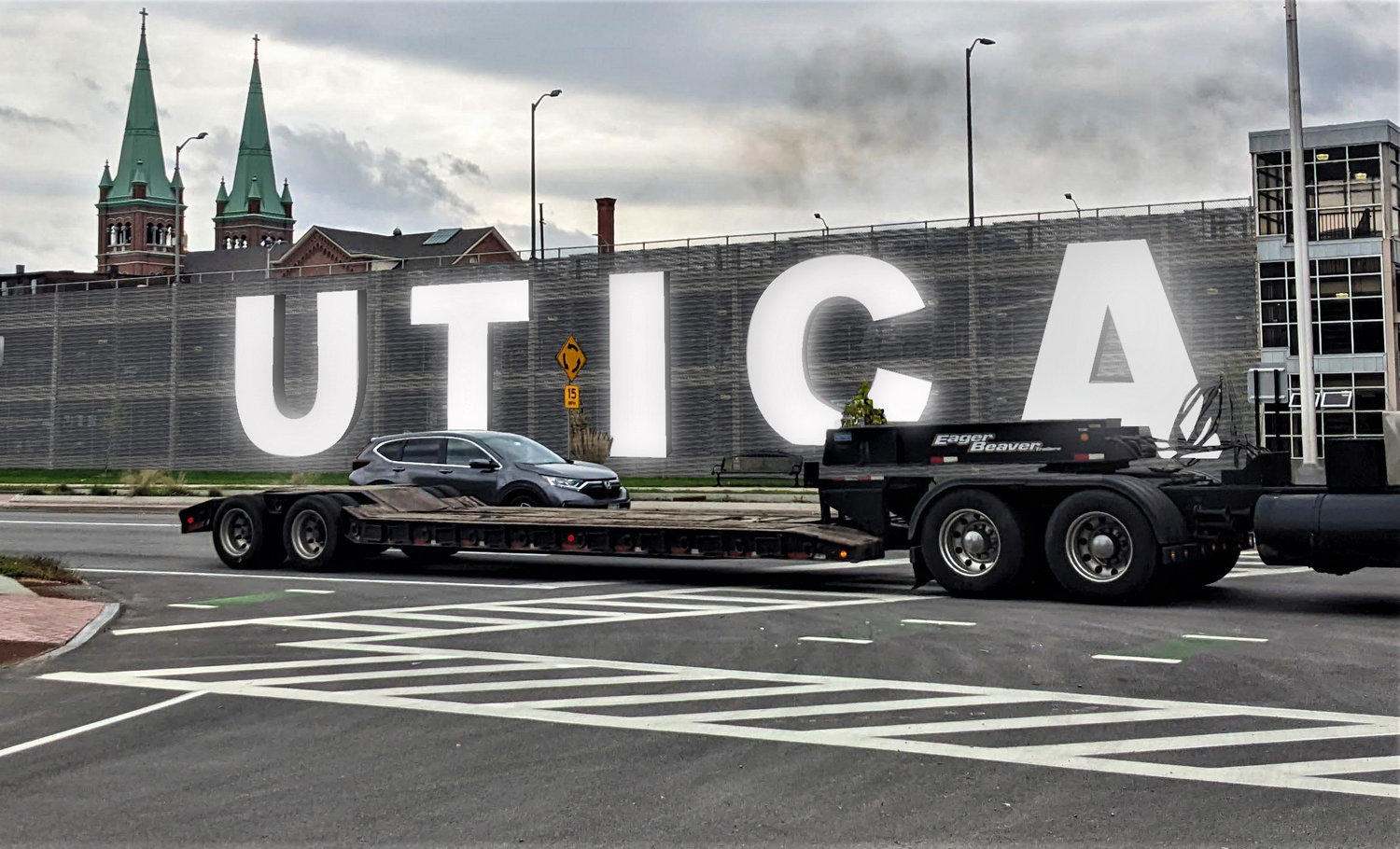 An artist’s rendering shows what a new electronic UTICA sign will look like when it is constructed on the north side of the Utica Place Garage, will be visible to visitors coming off of the State Thruway, and will serve as a source of civic pride for residents, officials said. It will feature 18-foot, LED letters.