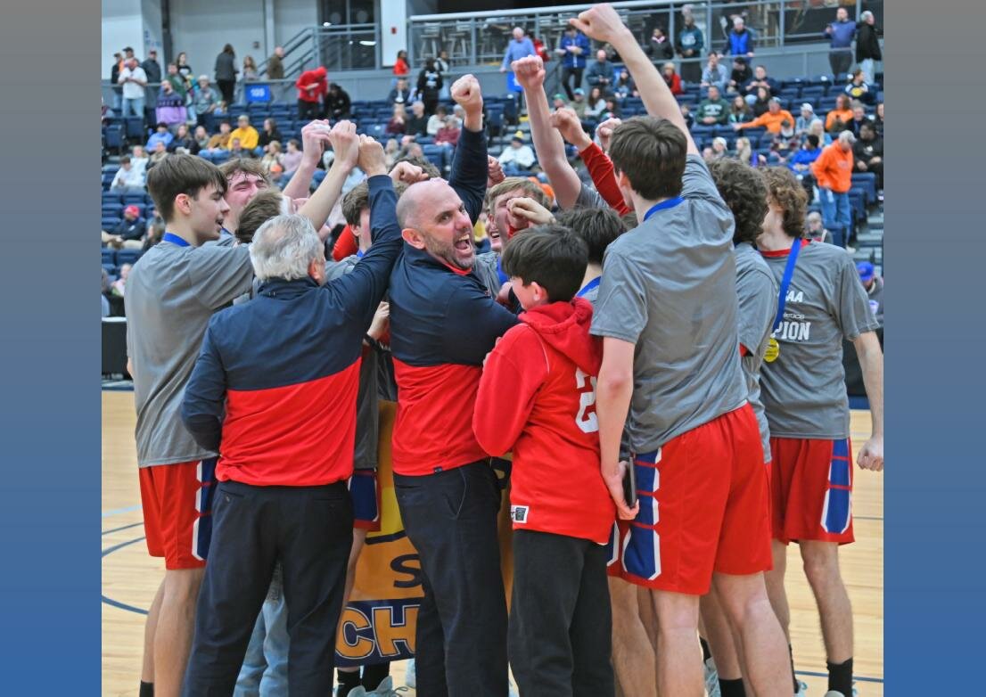 New Hartford boys basketball team celebrates their Section III championship earlier this month. The Spartans are back in the Class A final four for the second time in as many seasons. The team is scheduled to play at 6 p.m. Friday in Glens Falls.