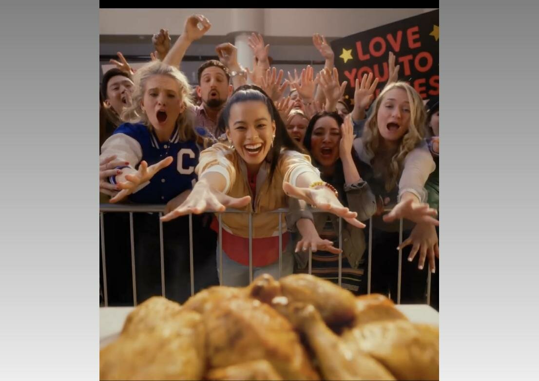 Emilya Washeleski, of Taberg, can be seen at left with her “Camden School-like” jacket during the Wegmans commercial that aired during the Super Bowl and Oscars.