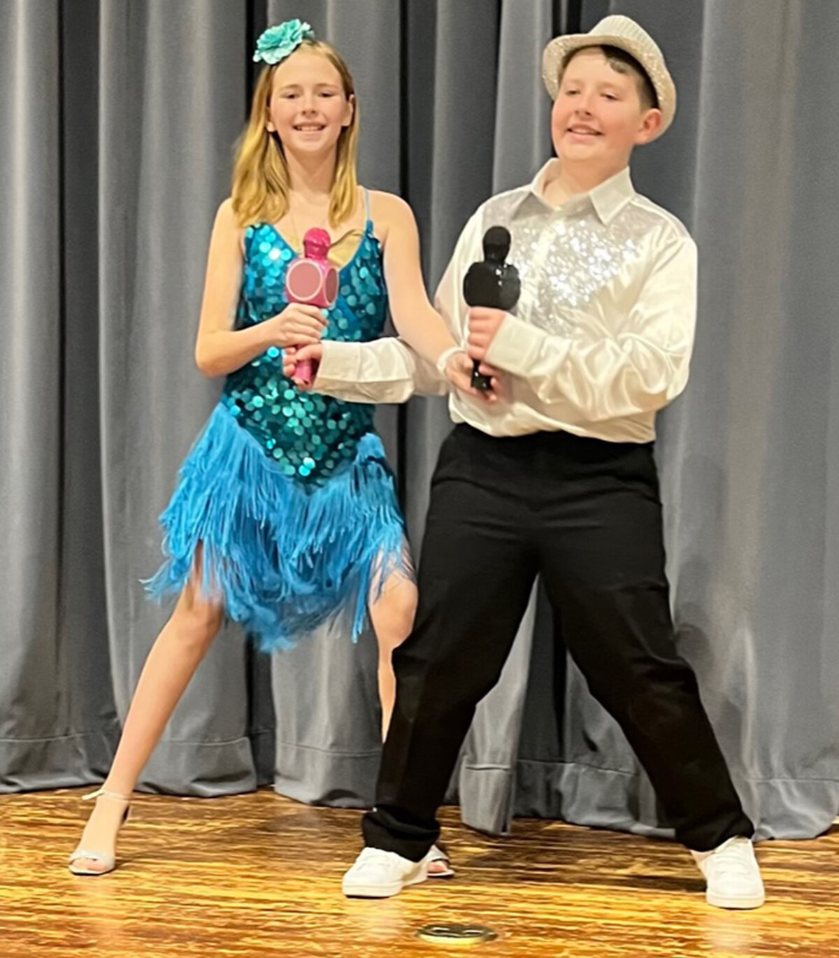 Alexis Pape as Sharpay, left, and Logan Edick as Ryan rehearse a scene from Disney’s “High School Musical” to prepare for their performance on stage at 6:30 p.m. March 23 and 24 in the Strough Junior High School auditorium in Rome. The show is free with general admission.