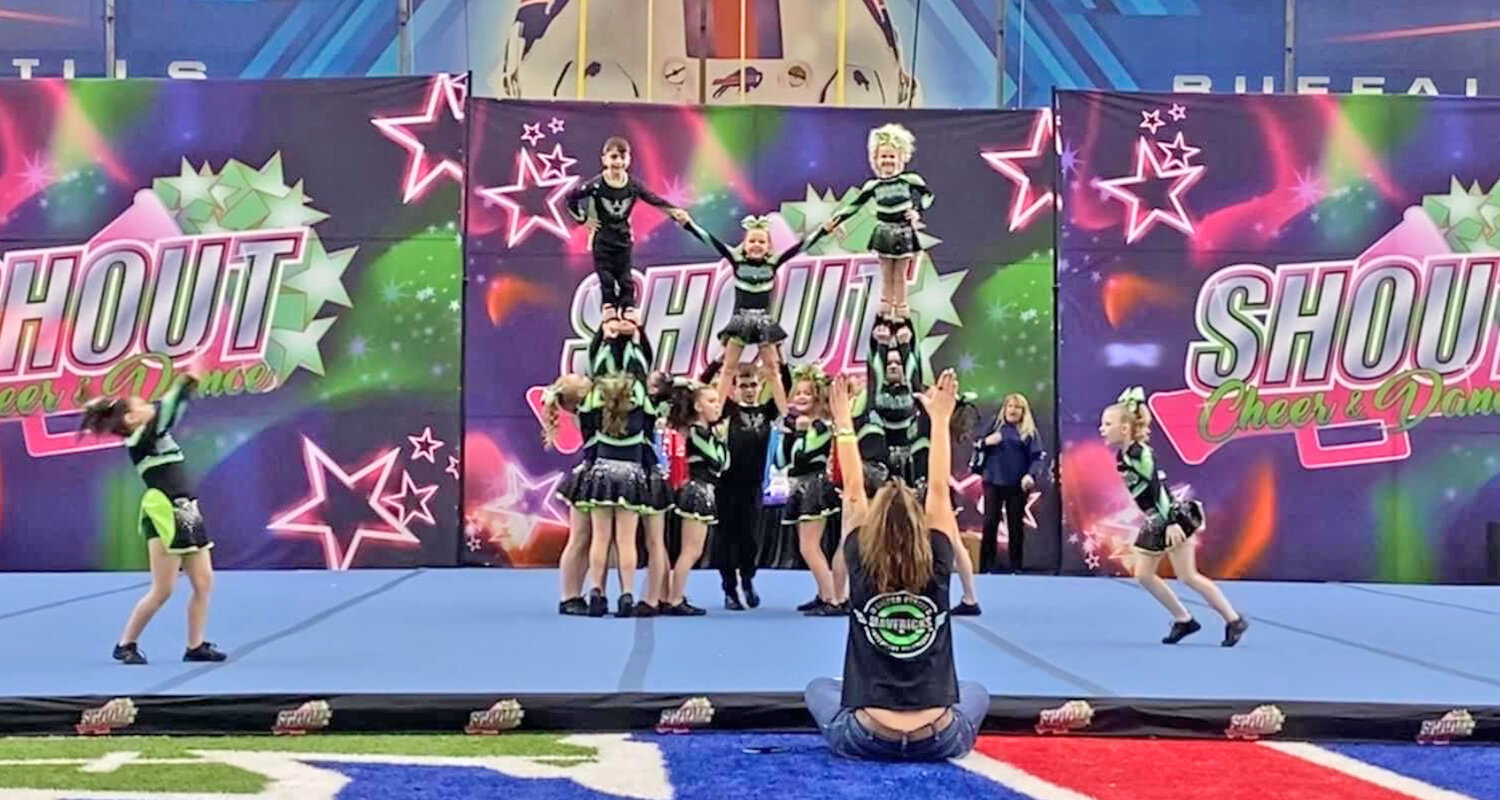 Members of the Mavericks Competitive Cheer Program Special Ops team, for youth ages 12 and under, go through their routine recently. The Mavericks Competitive Cheer Program won big at a national event in Buffalo and now has its sights set on international competitions.
