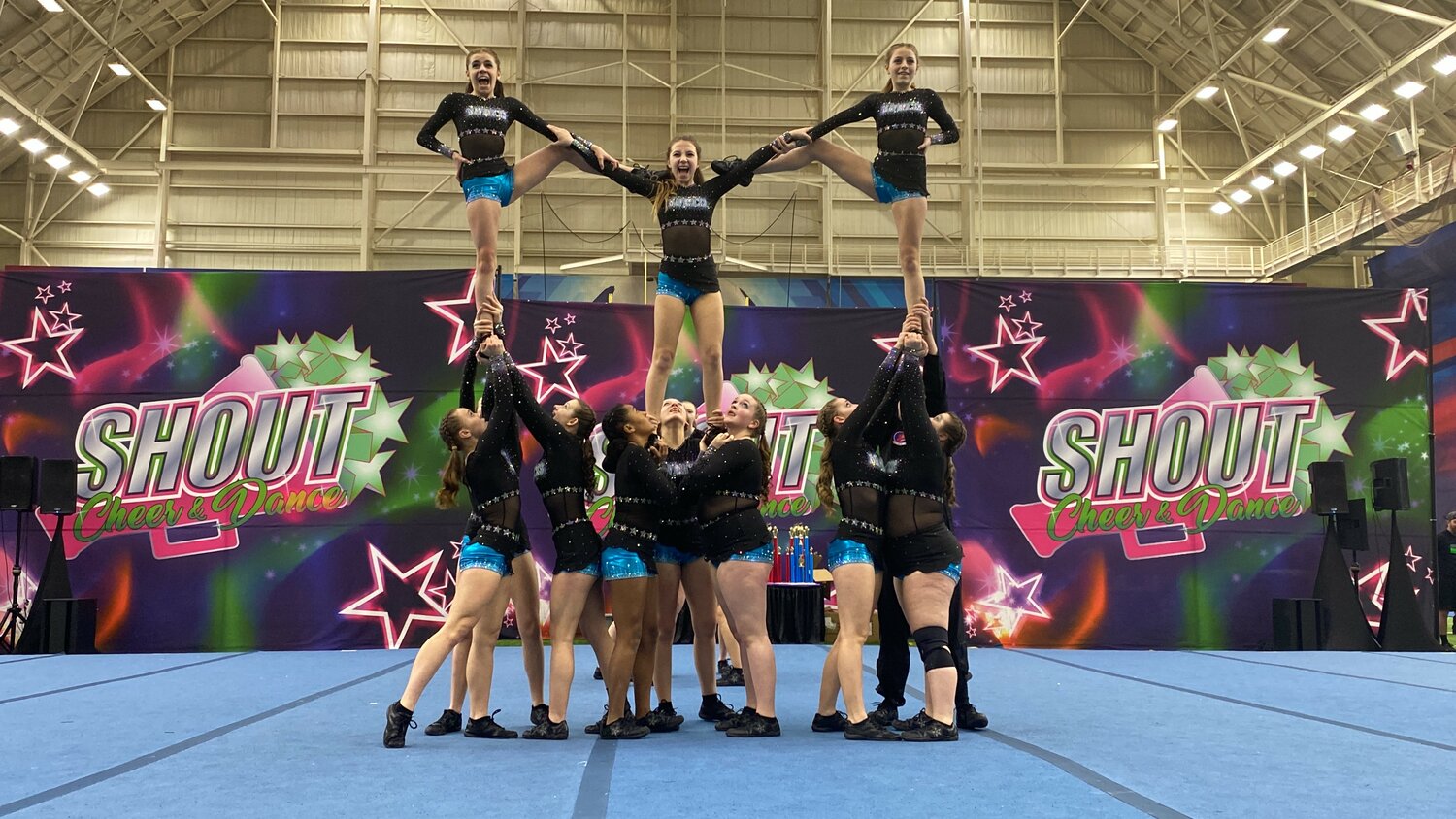 Members of the Mavericks Competitive Cheer Program Special Ops team, for youth ages 12 and under, perform recently. The Mavericks Competitive Cheer Program won big at a national event in Buffalo and now has its sights set on international competitions.
