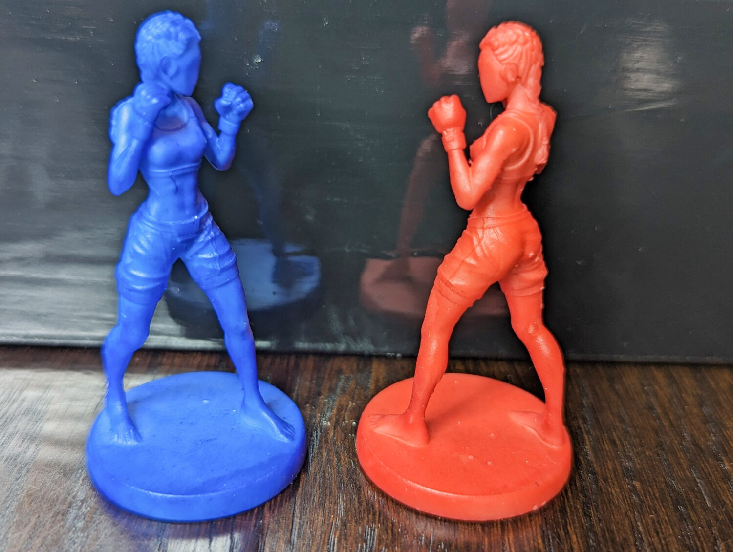 Caged In is bringing mixed martial arts to the world of board games and grows into crowfunding on GameFound.com on Wednesday, March 29. Pictured is the player pieces.