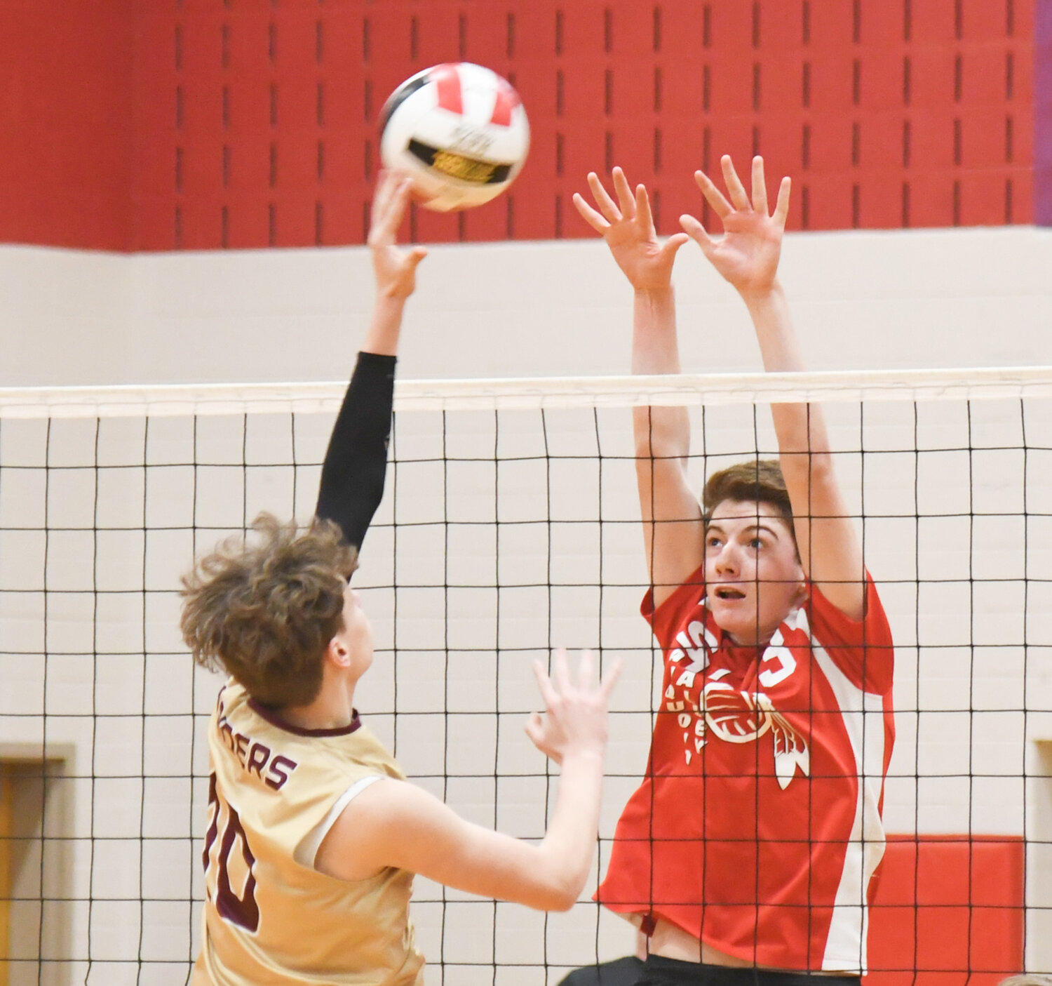 Mason Farwell of Sauquoit Valley, right, goes up for a block against Canastota in the Section III Class C championship in this file photo. Farwell was named the Section III Division I player of the year.