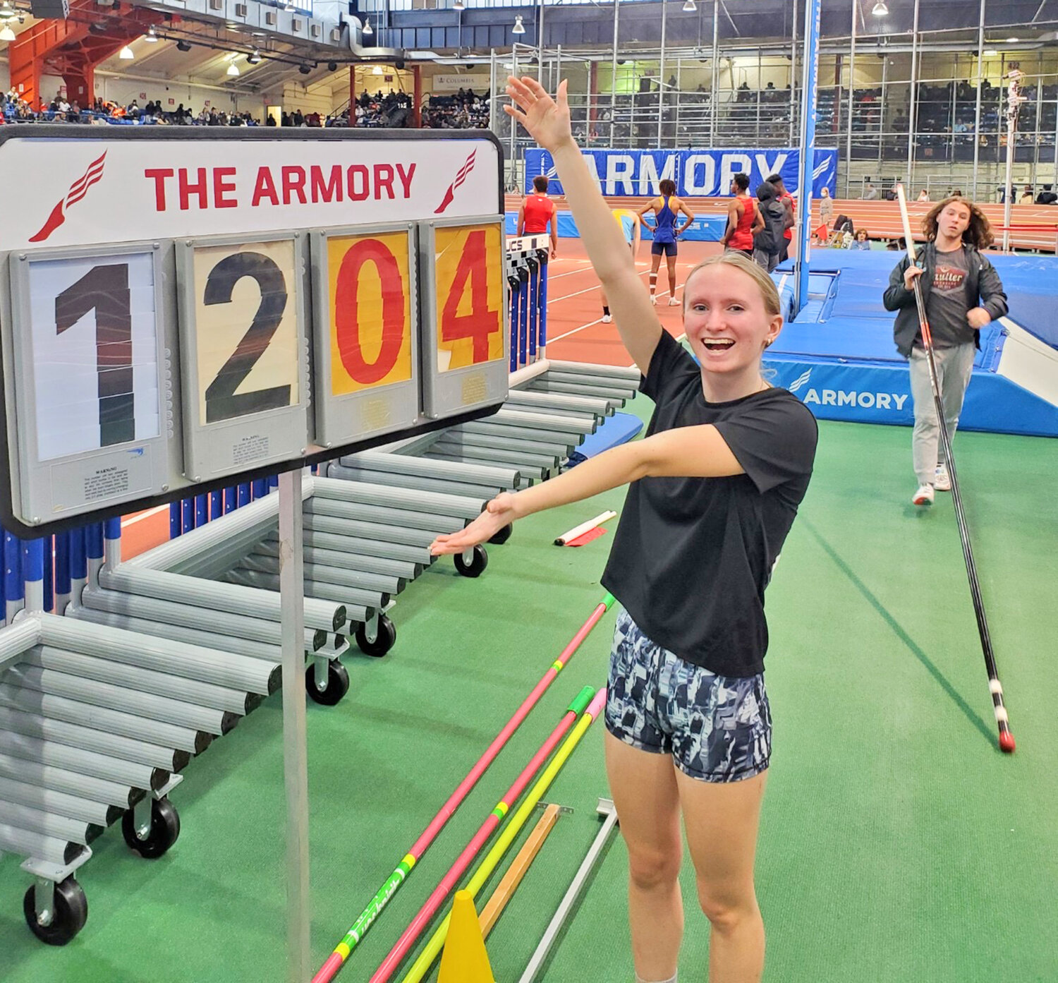 Herkimer Central School senior Melia Couchman celebrates after winning the championship in the girls pole vault emerging elite category at the Nike Indoor Nationals.