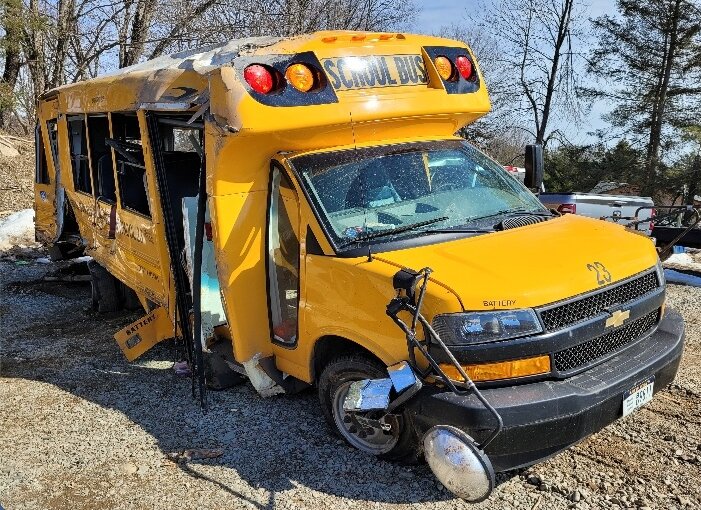 This Mexico Academy school bus was heavily damaged — and a bus monitor was fatally wounded — when it pulled in front of a pickup truck in Oswego County early Wednesday morning, according to the New York State Police.