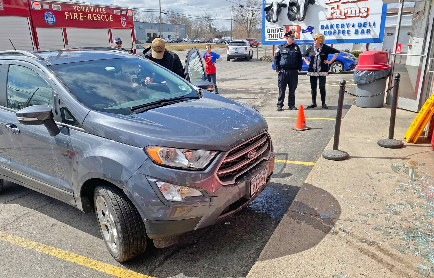 Yorkville Police investigate after the driver of this SUV crashed into the front of Holland Farms Bakery &amp; Deli on Oriskany Boulevard in Yorkville Friday afternoon.