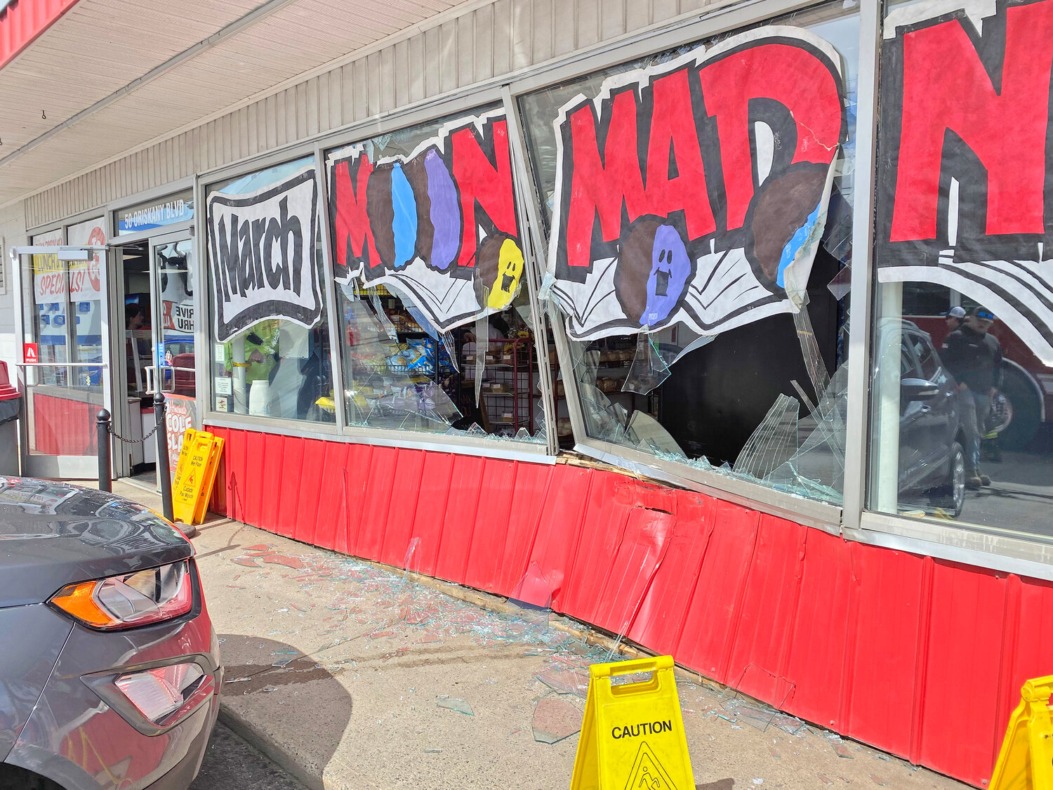 Holland Farms promised to stay open after an SUV jumped the curb and crashed into the front of their shop in Yorkville Friday afternoon. Yorkville Police are investigating.
