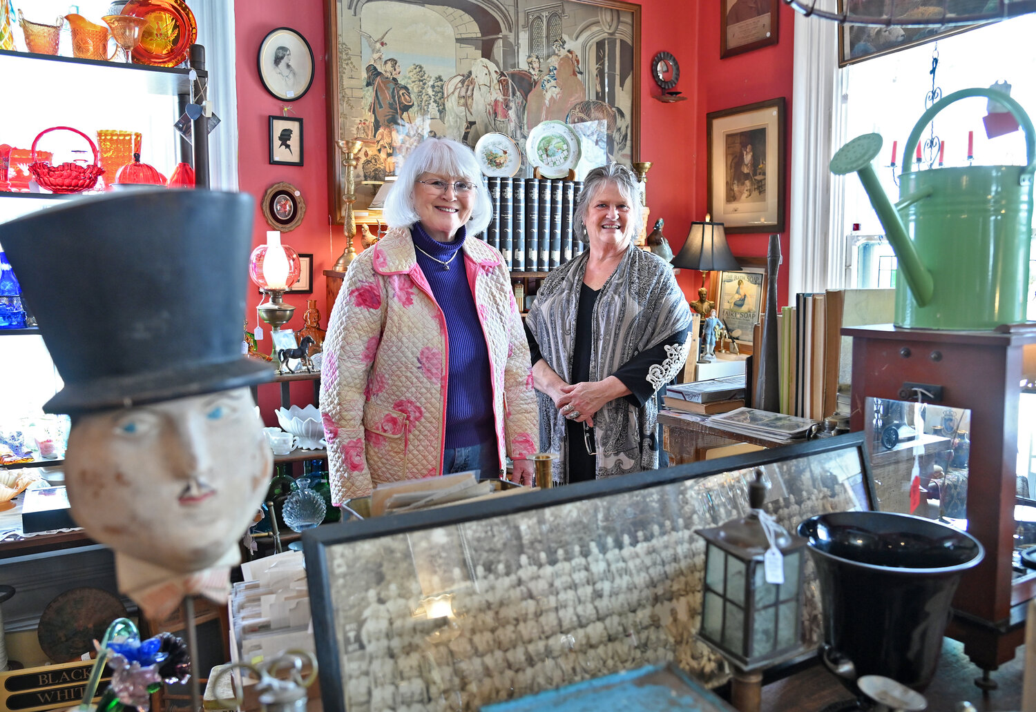 Victorian Rose owner Lynn Harvey, left, and new dealer Lindy Eschmann pose Friday, March 10 in the Bouckville shop.