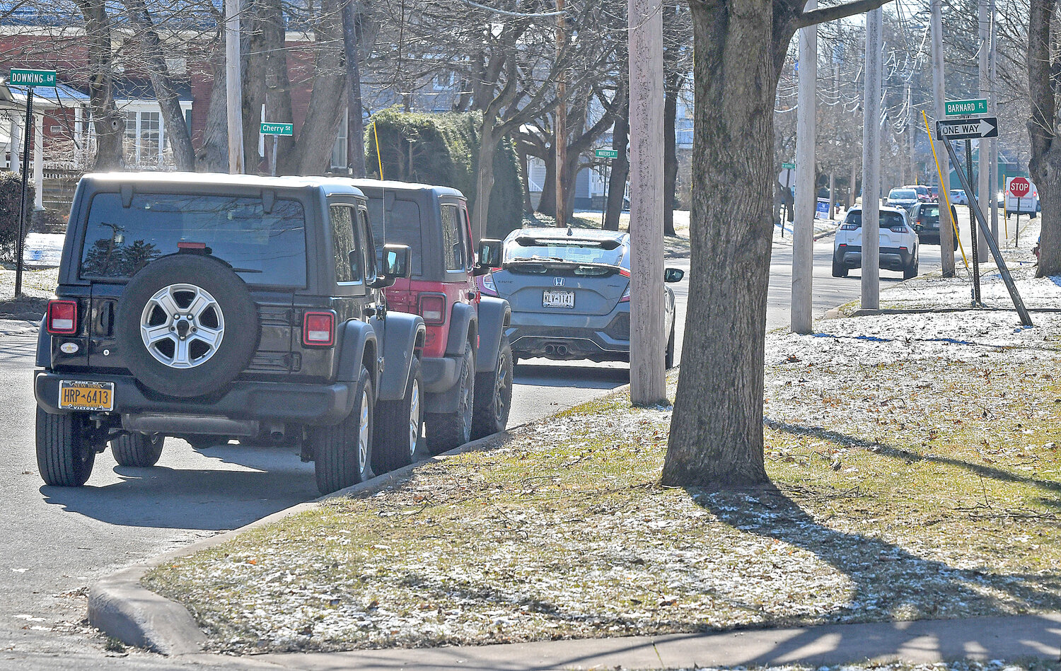 Multiple vehicles are already parked along Elm Street in Rome, just around the corner of North Madison Street. The city’s ban on overnight parking will be lifted on Saturday.
