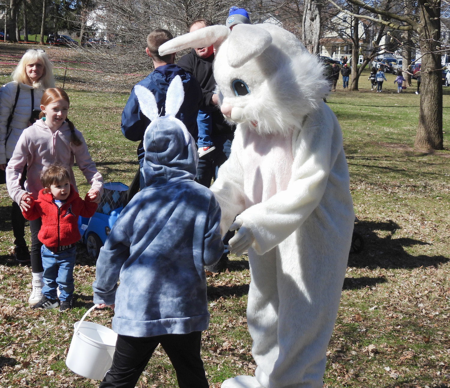 The annual Oneida Easter Egg Hunt saw kids of all ages in Allen Park filling their bags and baskets with eggs on Saturday, April 8 in Oneida. Pictured are children coming up to the Easter Bunny for a hug.