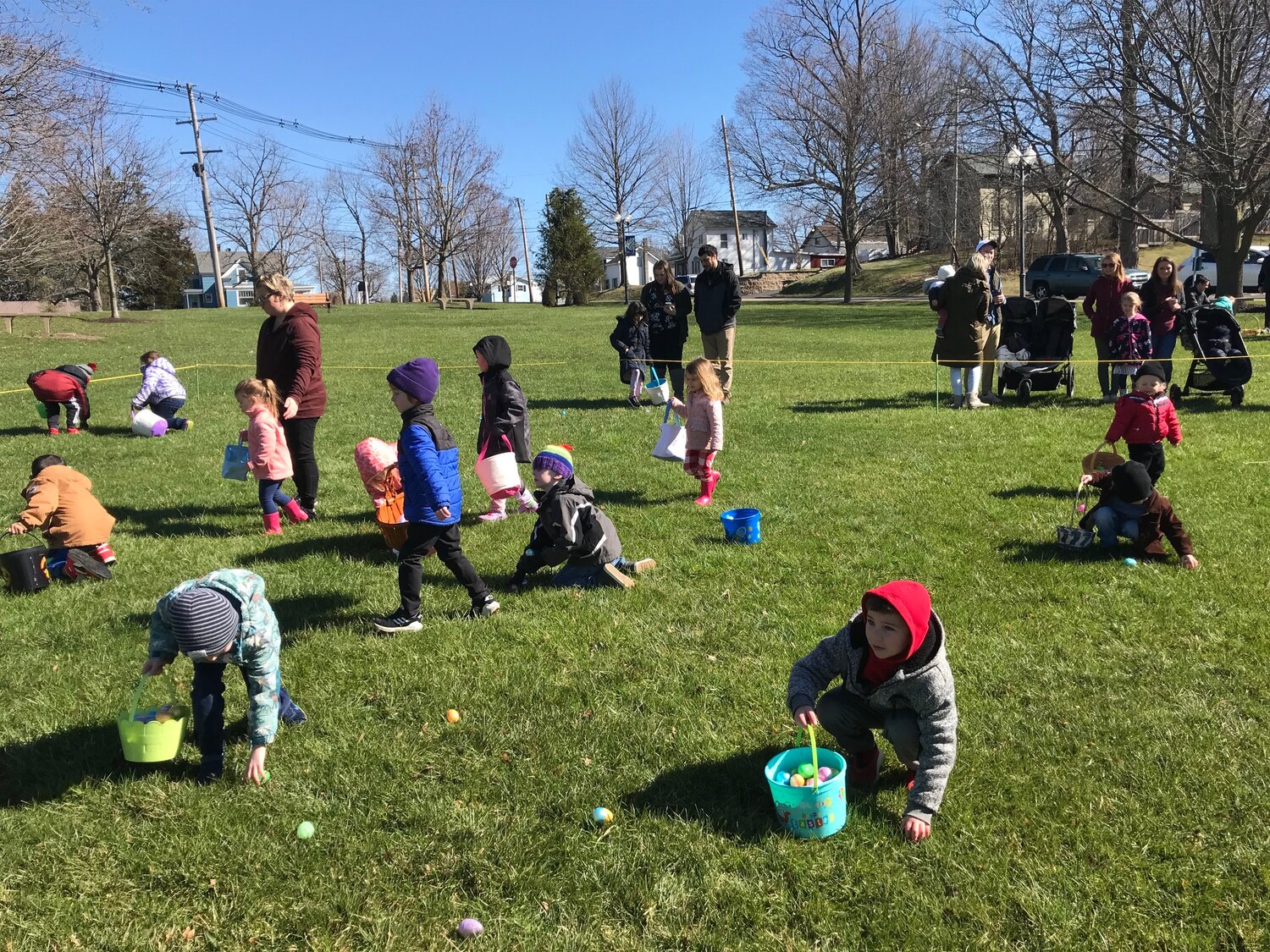 Area youngsters pick the Reilly-Mumford Memorial Park clean of plastic eggs Saturday, April 8 during the annual Easter Egg Hunt in Sherrill.