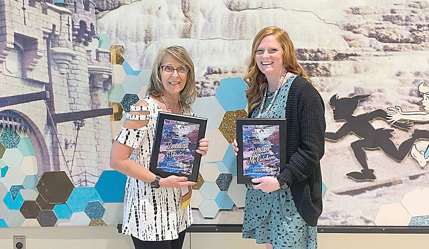Heather McCutcheon, right, poses with fellow New York State Art Month co-chair Donnalyn Shuster recently while holding their awards at the National Art Education Association 2023 Convention in San Antonio. Their third co-chair Tracy Berges was unable to attend.