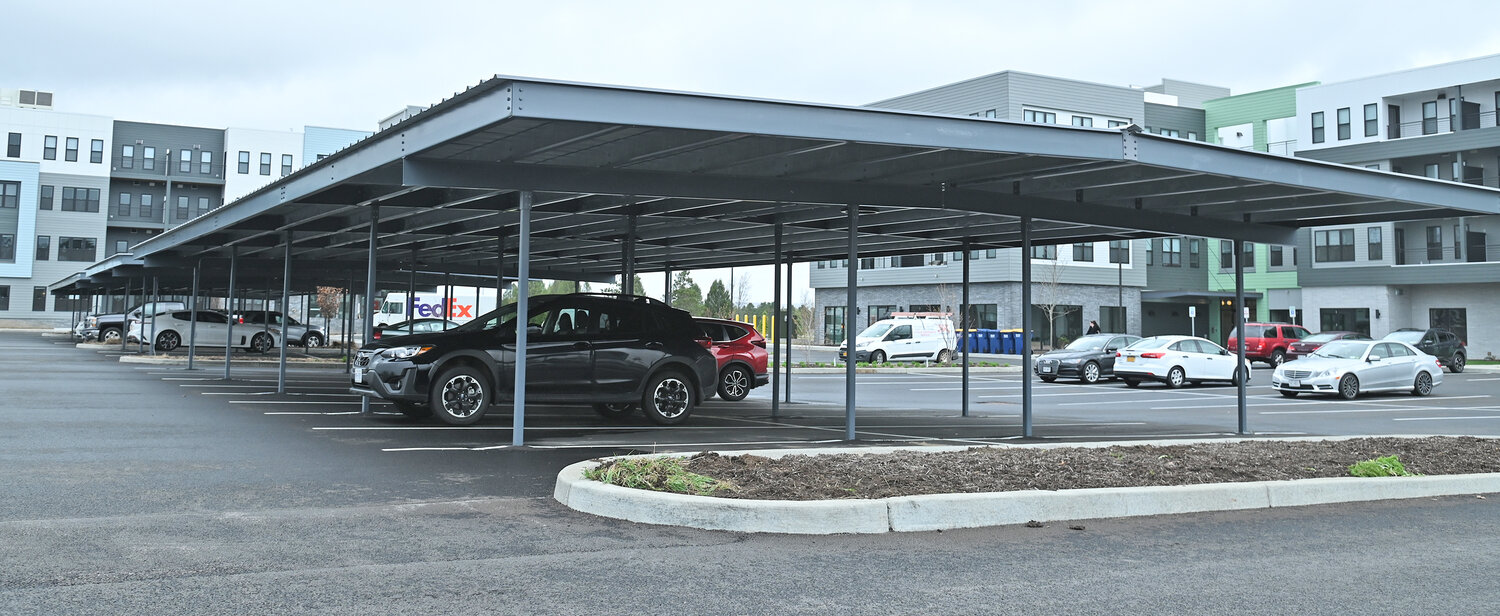 This canopy over parking spaces at Air City Lofts on the Griffiss Business and Technology Park is an example of what Mayor Izzo hopes to install when the Fort Stanwix Parking Garage is demolished later this year.